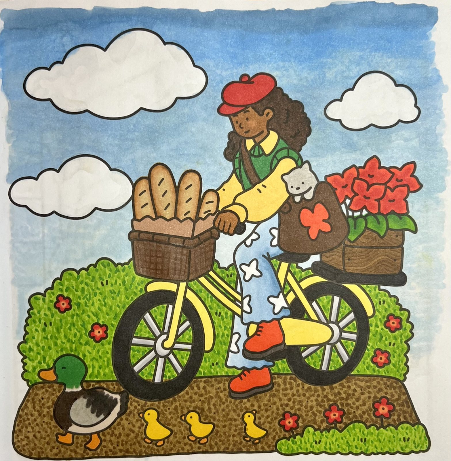 My finished coloring page: bread and a bike