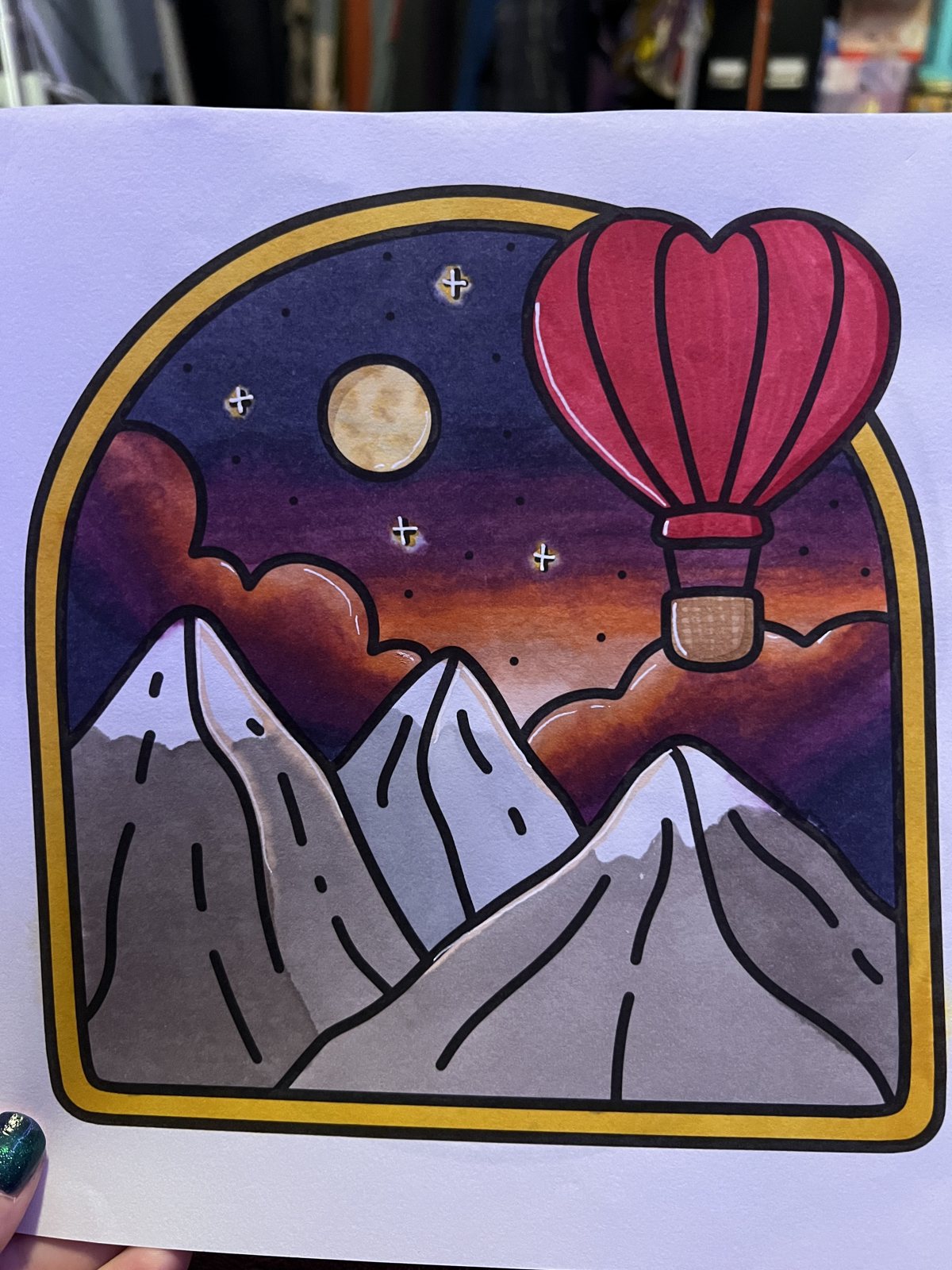 My finished coloring page: balloons over the mountains